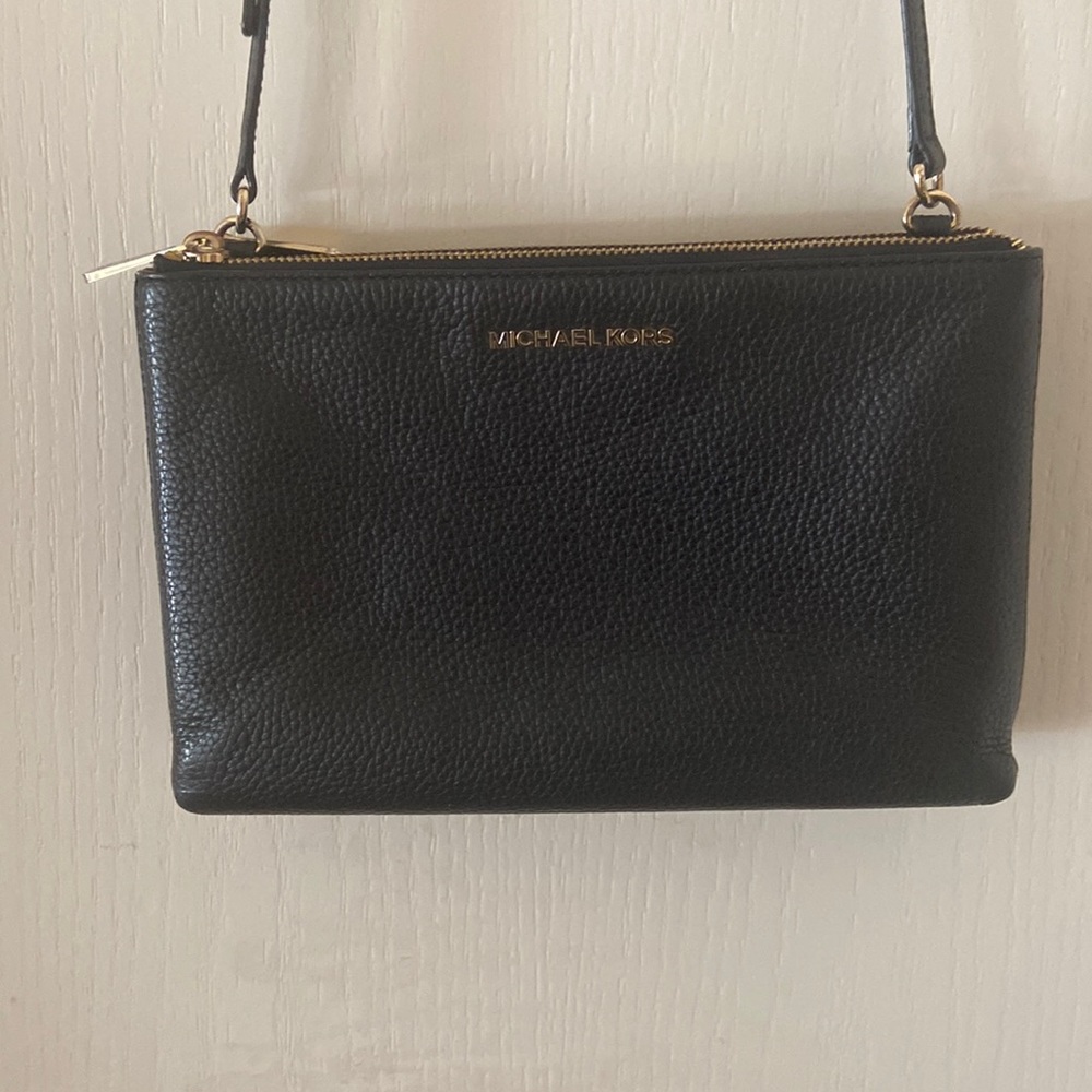 Michael lots, black leather, gold hardware, adjustable crocs body bag